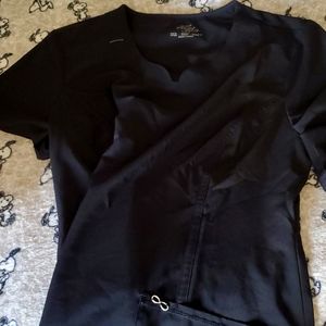 Cherokee Infinity Scrub tops each sold for 29.00